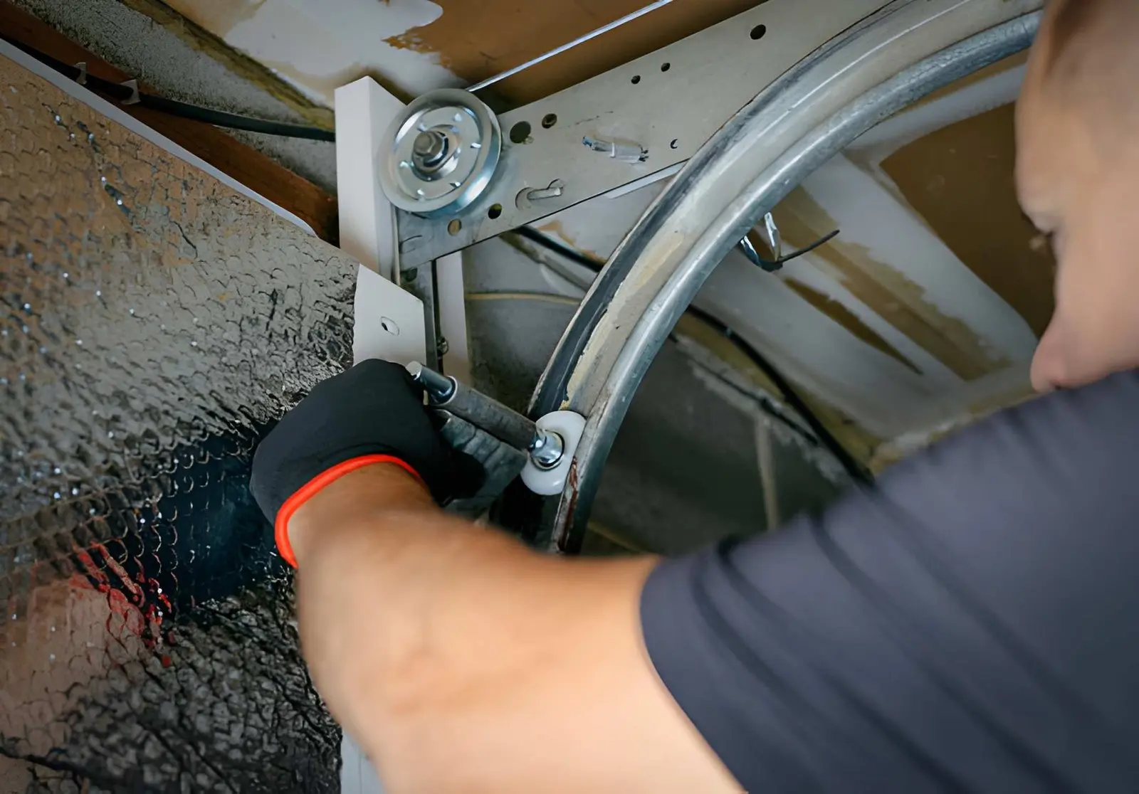 Expert conducting Garage Door Repair on automatic opener system testing